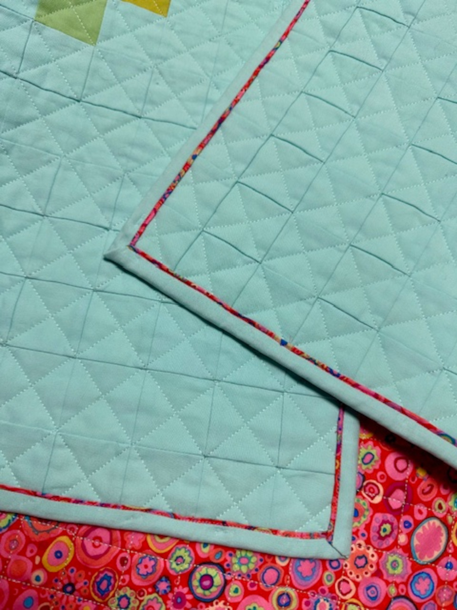 Quilt binding ideas: machine and hand-stitched options - Piping binding always adds interest, machine attached.