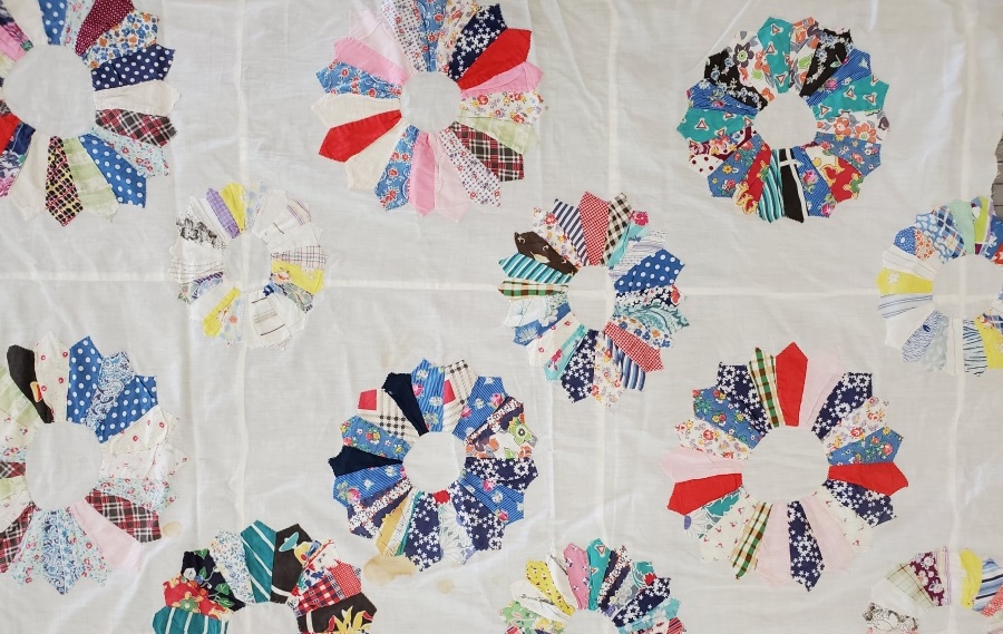 vintage dresden plate pieced colorful quilt top with white backing