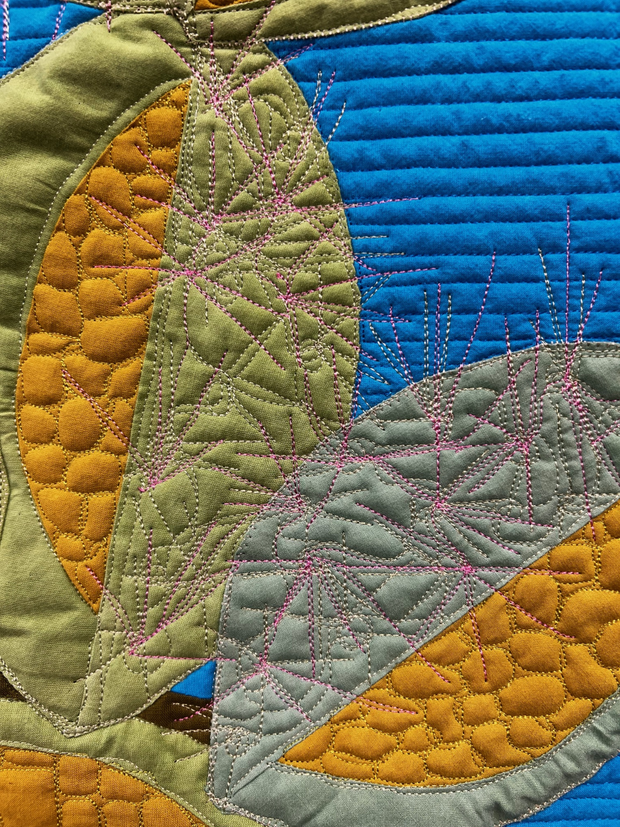 Detail of Desert Cactus art quilt by Arlene Blackburn showing a variety of quilting techniques